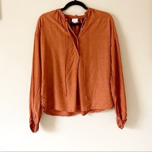 A new day• burnt orange light weight top
